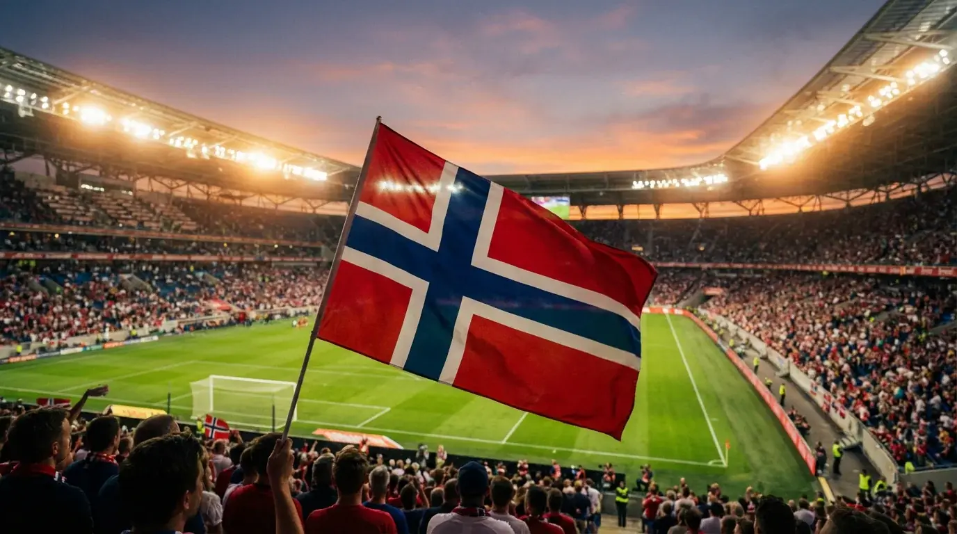 Det norske flagget vaier foran et fullsatt stadion under VM 2026